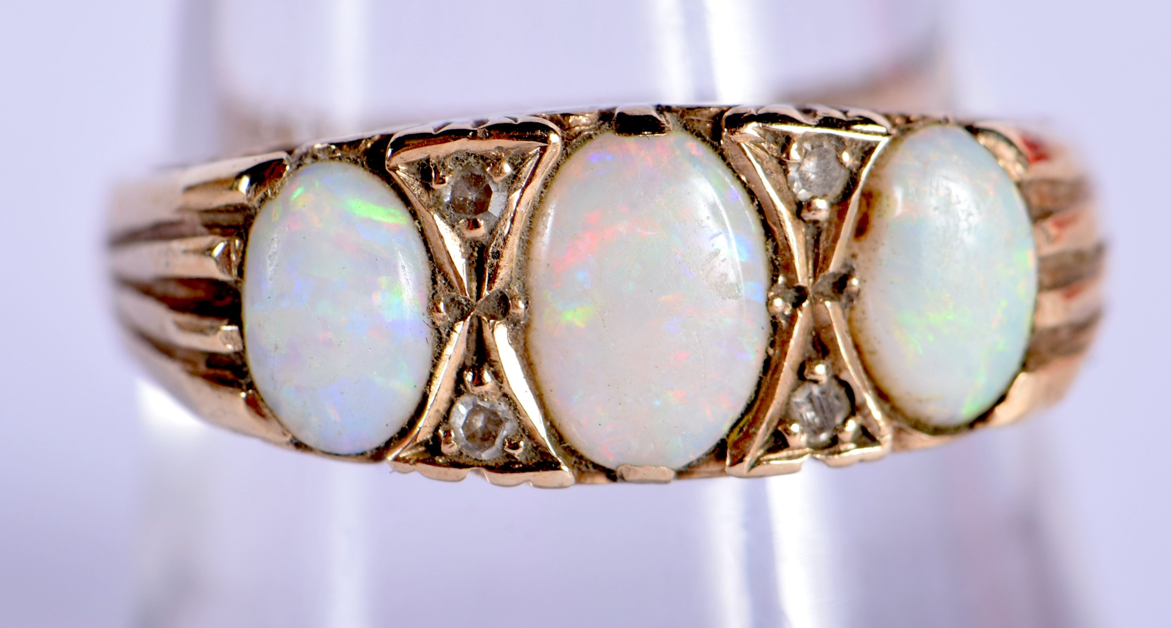A 9CT GOLD AND OPAL RING. Size P, weight 2.96g