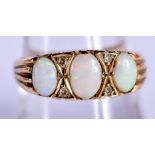 A 9CT GOLD AND OPAL RING. Size P, weight 2.96g