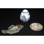 A Chinese bronze brush pot in the shape of a fish, together with two Chinese ceramic items. 13.5cm (