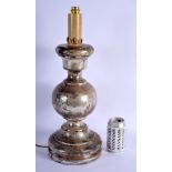 AN ANTIQUE SILVERED CONTINENTAL WOOD CANDLESTICK LAMP. 49 cm high.
