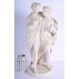 A LARGE ANTIQUE PARIAN WARE FIGURE OF A MALE AND FEMALE overlaid with a goat skin. 46 cm high.