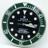 A contemporary Rolex dealership clock 34cm