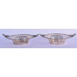 A PAIR OF VINTAGE CONTINENTAL TWIN HANDLED SILVER BON BON DISHES. 177 grams. 16 cm x 12 cm.