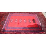 A Persian rug 167 x 131 cm.