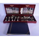 TWO CASED CANTEENS OF SILVER PLATED CUTLERY together with a leather cased book. (qty)