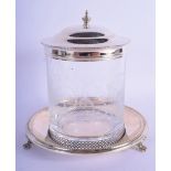 AN UNUSUAL VINTAGE SILVER MOUNTED CUT GLASS BISCUIT BARREL upon a silver stand. Silver 378 grams. 19