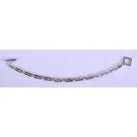 A 9CT WHITE GOLD AND DIAMOND BRACELET. 17cm long, weight 8g