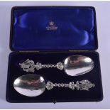 AN UNUSUAL PAIR OF VICTORIAN SILVER SPOONS. 109 grams. 17 cm long.