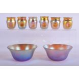SIX LOUIS COMFORT TIFFANY FAVRILLE IRIDESCENT GLASSES with two matching bowls. Largest 10 cm diamete