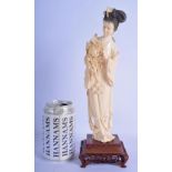 A LATE 19TH CENTURY CHINESE CARVED IVORY FIGURE OF A STANDING FEMALE IMMORTAL Qing. Ivory 27 cm high