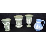 A collection of Wedgwood Jasperware; flower vase, pedestal vase, jug, etc. 17cm (5)