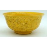 A Chinese yellow ground porcelain dragon bowl. 8 x 15.5cm