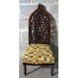 A small 19th century carved wood chair with upholstered seat 105 x 49 x 45cm