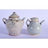 A 14TH/15TH CENTURY CHINESE WHITE GLAZED EWER AND COVER together with a similar smaller ewer. Larges
