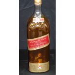 A display only vintage Johnnie Walker Red Label scotch whiskey bottle. 47 x 14cm
