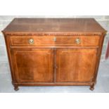 An antique walnut veneered continental two draw cabinet inlaid on doors and top. 88 x 116 x 59
