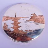 A BRITTANIA SILVER COMPACT WITH AN ORIENTAL SCENE INLAID IN COPPER. Marked 950, 8cm diameter, weigh