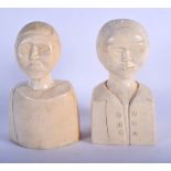 A RARE PAIR OF EARLY 20TH CENTURY AFRICAN TRIBAL COLONIAL CARVED IVORY BUSTS. 12 cm x 5 cm.