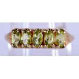 A 9CT GOLD AND GEMSTONE RING. Size P, weight 3.1g