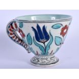 A 19TH CENTURY CANTAGALLI PORCELAIN FAIENCE IZNIK TYPE CUP painted with flowers. 9 cm wide.