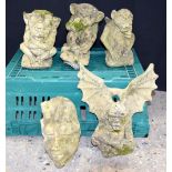 A collection of stone composite Gargoyle garden statues largest 33cm (5).