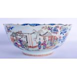 AN UNUSUAL 18TH CENTURY CHINESE EXPORT FAMILLE ROSE BLUE AND WHITE BARBED BOWL Qianlong, painted wit