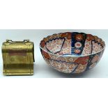 A Japanese Imari porcelain bowl together with a vintage brass money box largest 25cm (2)