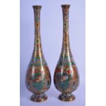 A PAIR OF LATE 19TH CENTURY JAPANESE MEIJI PERIOD CLOISONNE ENAMEL VASES decorated with dragons and