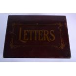 A VINTAGE PAINTED AND LACQUERED WOOD LETTER BOX. 34 cm x 22 cm.