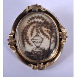 A VICTORIAN REVOLVING MOURNING PENDANT CONVERTED TO A BROOCH. 4.4cm x 4cm, weight 13.73g