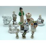 A collection of English and continental porcelain figures 22cm (11).