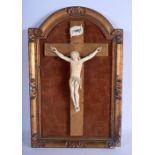 A 19TH CENTURY EUROPEAN CARVED IVORY CORPUS CHRISTI CRUCIFIX modelled upon a gilt frame. 40 cm x 27