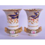 A PAIR OF EARLY 19TH CENTURY SPODE IMARI VASES painted with flowers. 12 cm high.