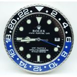 A contemporary Rolex dealership clock 34cm