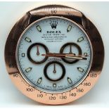 A contemporary Rolex dealership clock 34cm