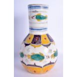 A TURKISH OTTOMAN KUTAHYA FAIENCE TYPE VASE painted with floral sprays. 22 cm high.
