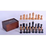 AN ANTIQUE BOXWOOD AND EBONY CHESS SET within a fitted case. Largest 8.25 cm high. (qty)