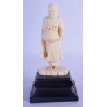 A 19TH CENTURY INDIAN CARVED IVORY FIGURE OF A STANDING BUDDHA modelled holding a censer. 15 cm high