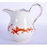 A MEISSEN PORCELAIN CREAM JUG painted with dragons. 11.5 cm high.