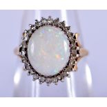 A 9CT GOLD AND OPAL RING. Size M, weight 3.42g