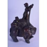 A LATE 19TH CENTURY CHINESE BRONZE ELEPHANT OKIMONO Qing, modelled with two attendants. 25 cm x 14 c