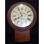 An Edwardian Gillett & Johnston mahogany wall clock. 81 x 60cm