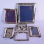 SIX SILVER PHOTOGRAPH FRAMES. London 1985 to 1993. 1962 grams overall. Largest 30 cm x 24 cm. (6)