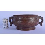 A LARGE TWIN HANDLED CHINESE BRONZE CENSER 20th Century, decorated with dragons and landscapes. 40 c