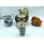 A large continental porcelain jug together with a blue and white Chinese jug etc (4)
