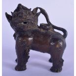 A 17TH/18TH CENTURY SOUTH EAST ASIAN BRONZE WATER DROPPER modelled as a buddhistic lion. 8 cm x 6 cm