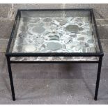 An unusual cast iron glass top table with a under glass display of Chinese ship wreck porcelain set