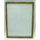 An antique heavy brass glazed picture frame 31 x 24cm .