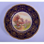 Royal Worcester fine plate by Raymond Rushton, signed, painted with an English country cottage and