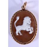 A 9CT GOLD MOUNTED CAMEO BROOCH CARVED WITH A LION. Hallmark Birmingham, 3.2cm x 1cm. 3g